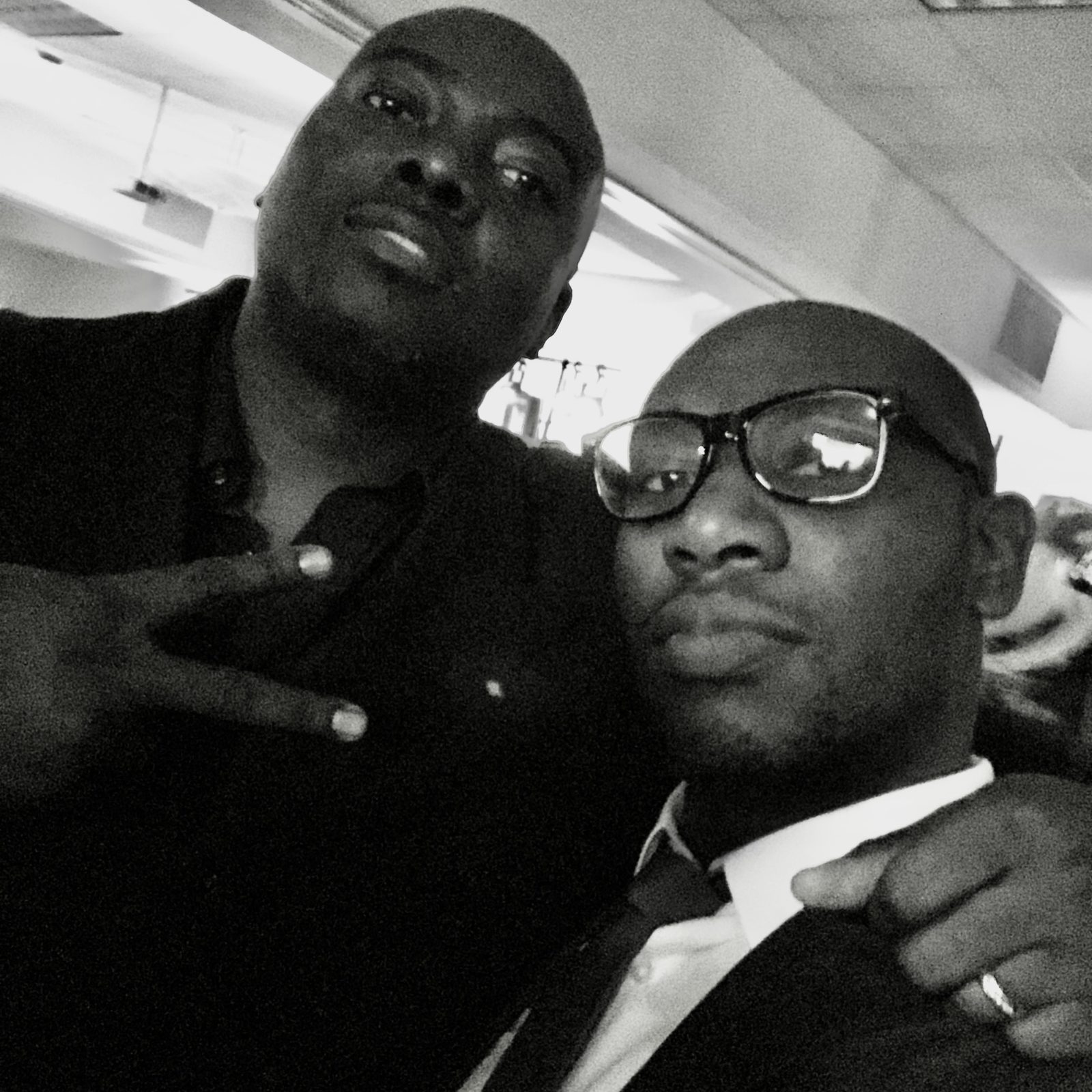 Emeka with family, black and white